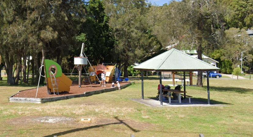 playground in park with picnic tables