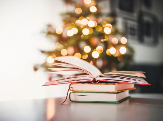 Christmas tree and a pile of books
