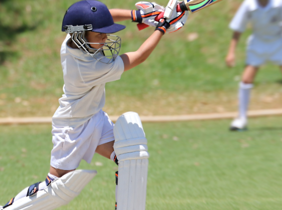 Child playing cricket